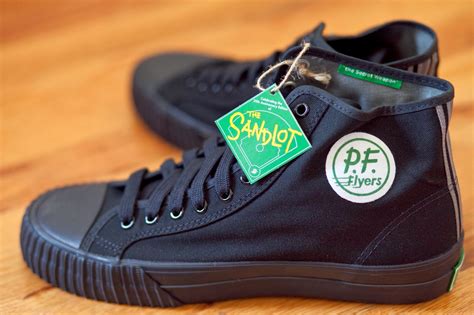 Sandlot pf flyers - Based upon Benny “The Jet” Rodriguez’s secret weapon from the 1993 classic, The Sandlot, the Made in USA Sandlot is a premium, all-black, 14 oz. heavyweight canvas Center Hi sneaker. As we’ve come to expect with PF’s domestic line, many of the details are completed by hand (such as the back tab and tongue stamp); while the shoe is ...